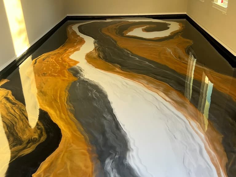 Custom gold, white, and black metallic epoxy finish